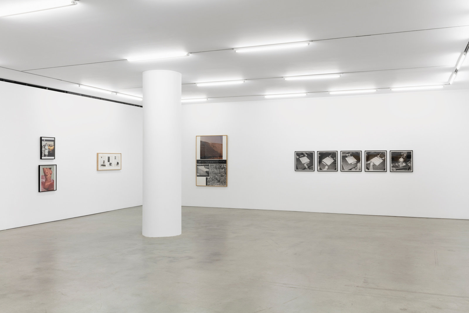 An installation view of four works hung on adjacent gallery walls. 