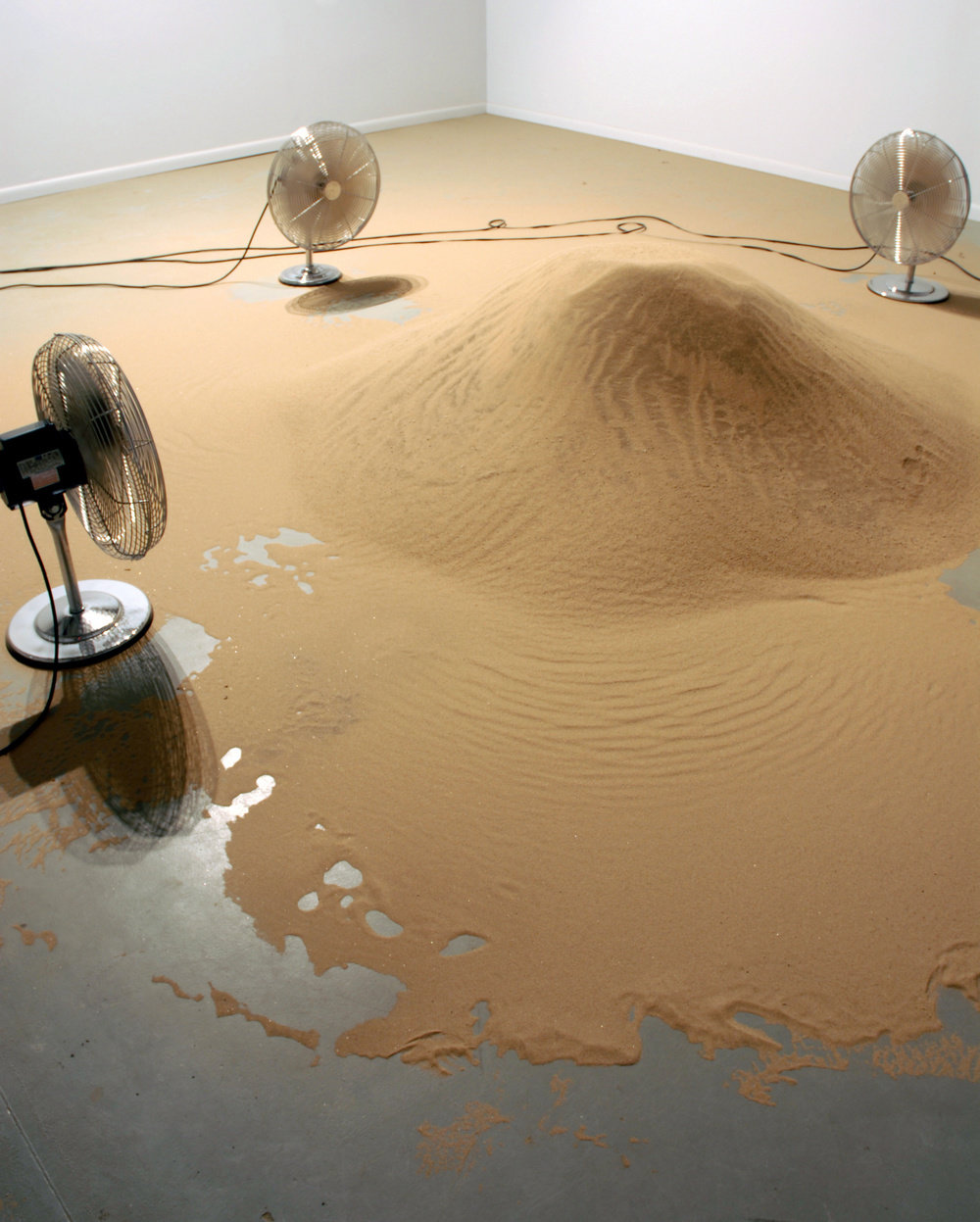 Aycock, sand fans (view 3), 1971, sand, four industrial fans, approximately 20 ft square